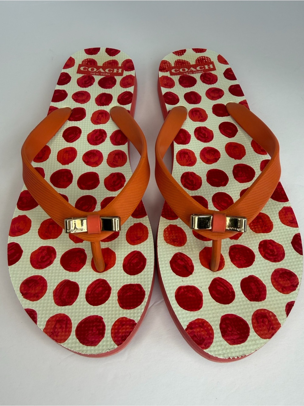COACH Amel Coral Orange Polka Dot Flip Flops Sandals Gold Bow Women’s 7–8